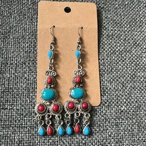 Red and blue chandelier costume earrings